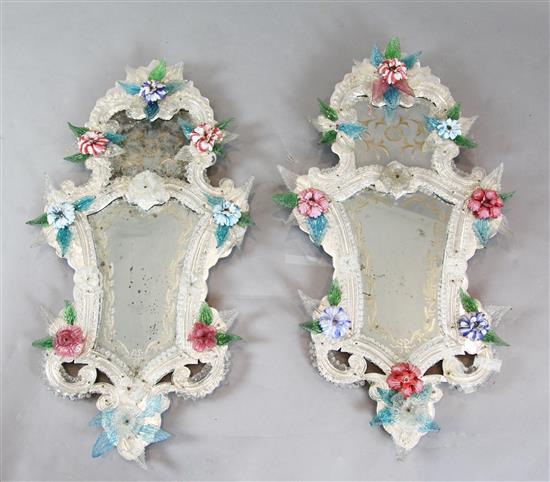 A pair of Venetian glass cartouche shaped wall mirrors, W.1ft 7in. H.3ft